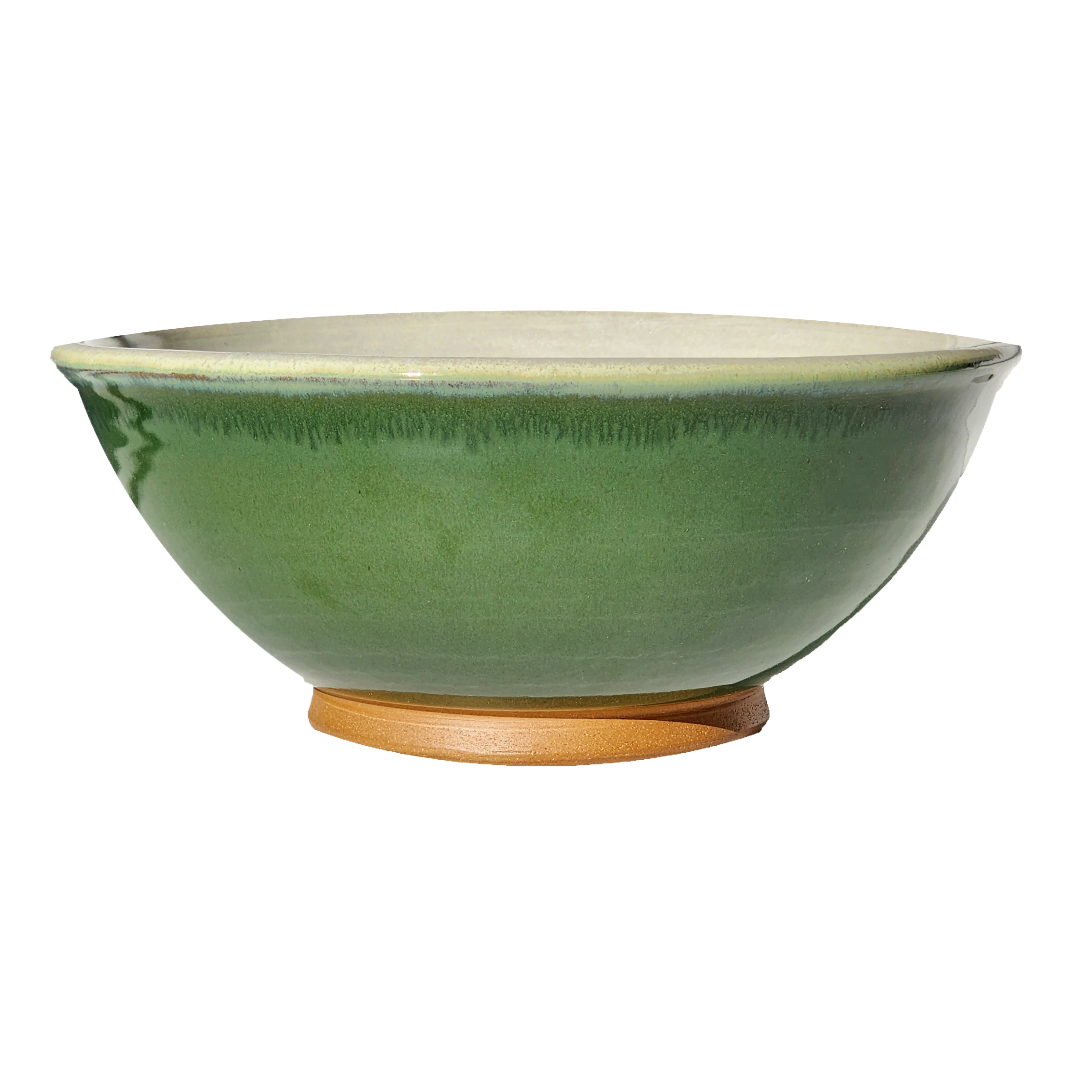 Image: A large mixing bowl in rich dark green, offering plenty of room with a capacity of 12.5 cups. Bring the beauty of nature into your kitchen while preparing delicious meals.