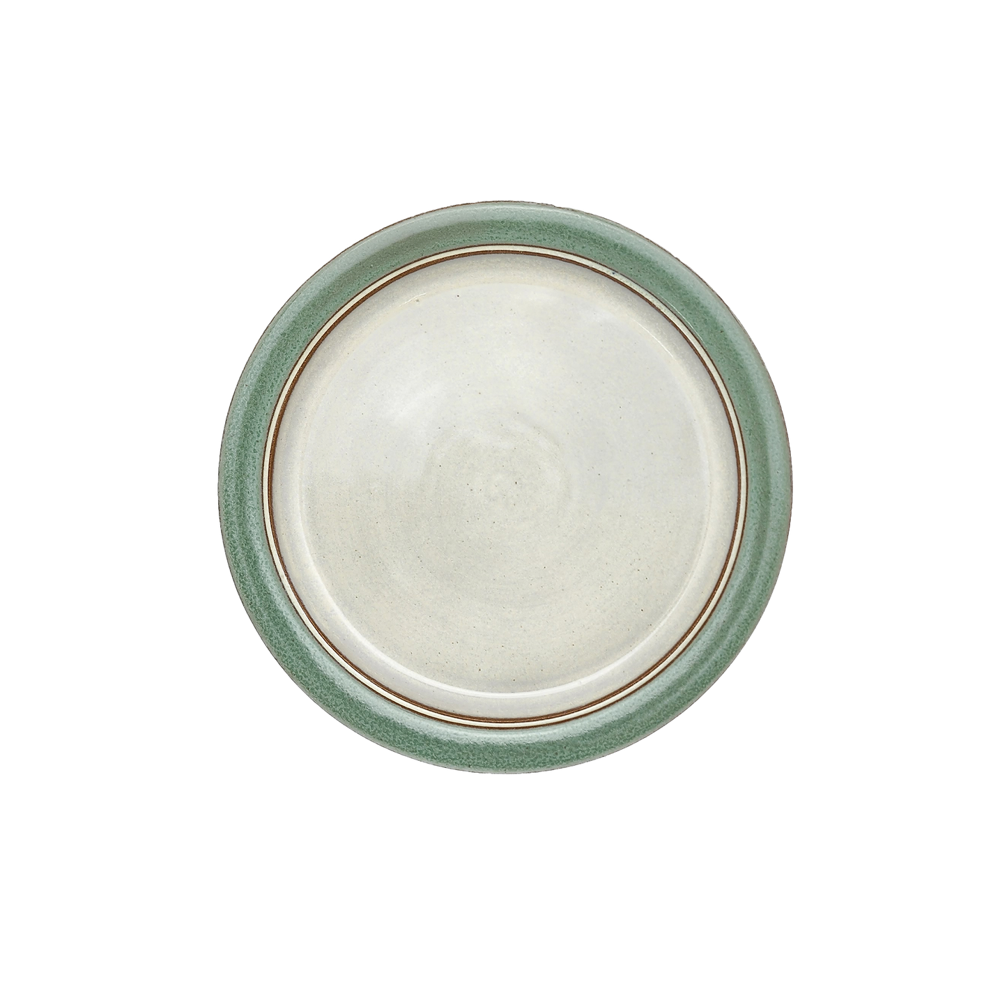 Image Description for Lunch Plate (8.5") in Light Green: A serene light green lunch plate from Clinton Pottery's Handmade Dinnerware Collection. The 8.5-inch plate features a gentle green glaze, evoking the tranquility of a spring meadow. Its versatile size makes it perfect for serving smaller meals or appetizers with a touch of natural charm and freshness.