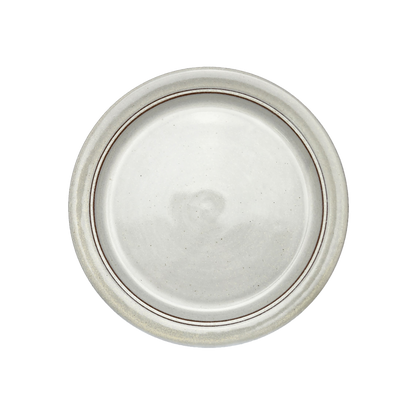 Image Description: A classic white dinner plate from Clinton Pottery's Handmade Dinnerware Collection. The 10-inch plate features a clean and timeless glaze, adding a touch of simplicity and elegance to your dining setting. Its ample size makes it perfect for serving a delightful dinner with a versatile and classic aesthetic.